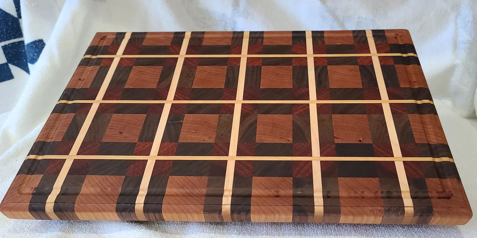 Plaid Cutting Board in Hard Maple, Black Walnut, Cherry, Padauk — handcrafted by Timber and Tides Woodcraft in Northern Colorado